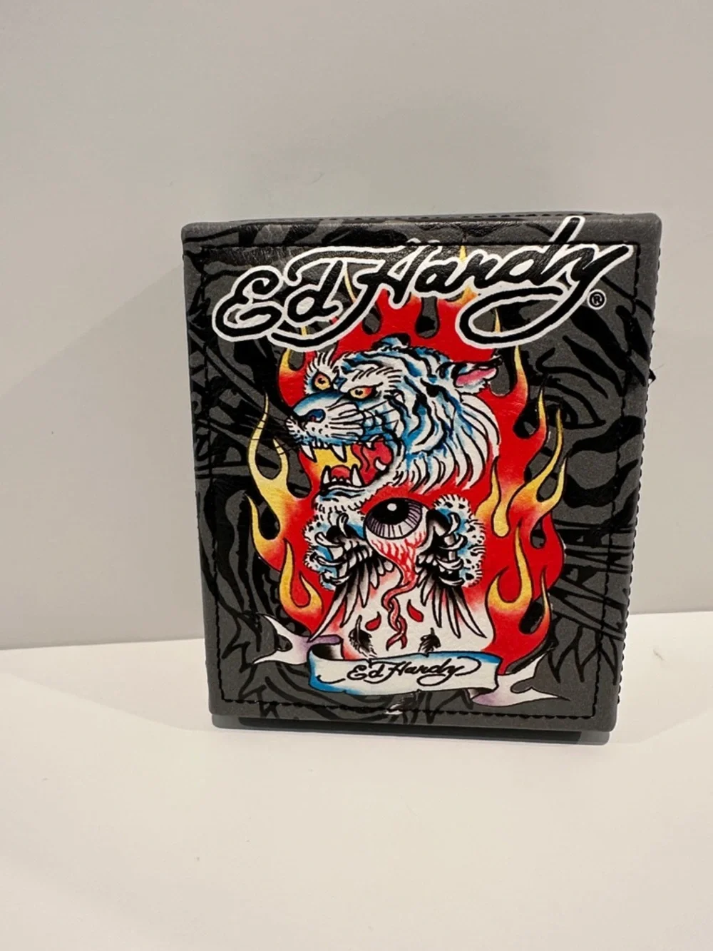 NWT Ed Hardy Men’s Bifold Wallet with Card, ID, Coin and Bill slots.